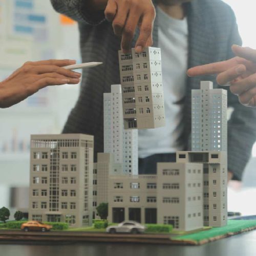 vecteezy_team-of-architectures-and-businessmen-discussing-and_45112330 (1)